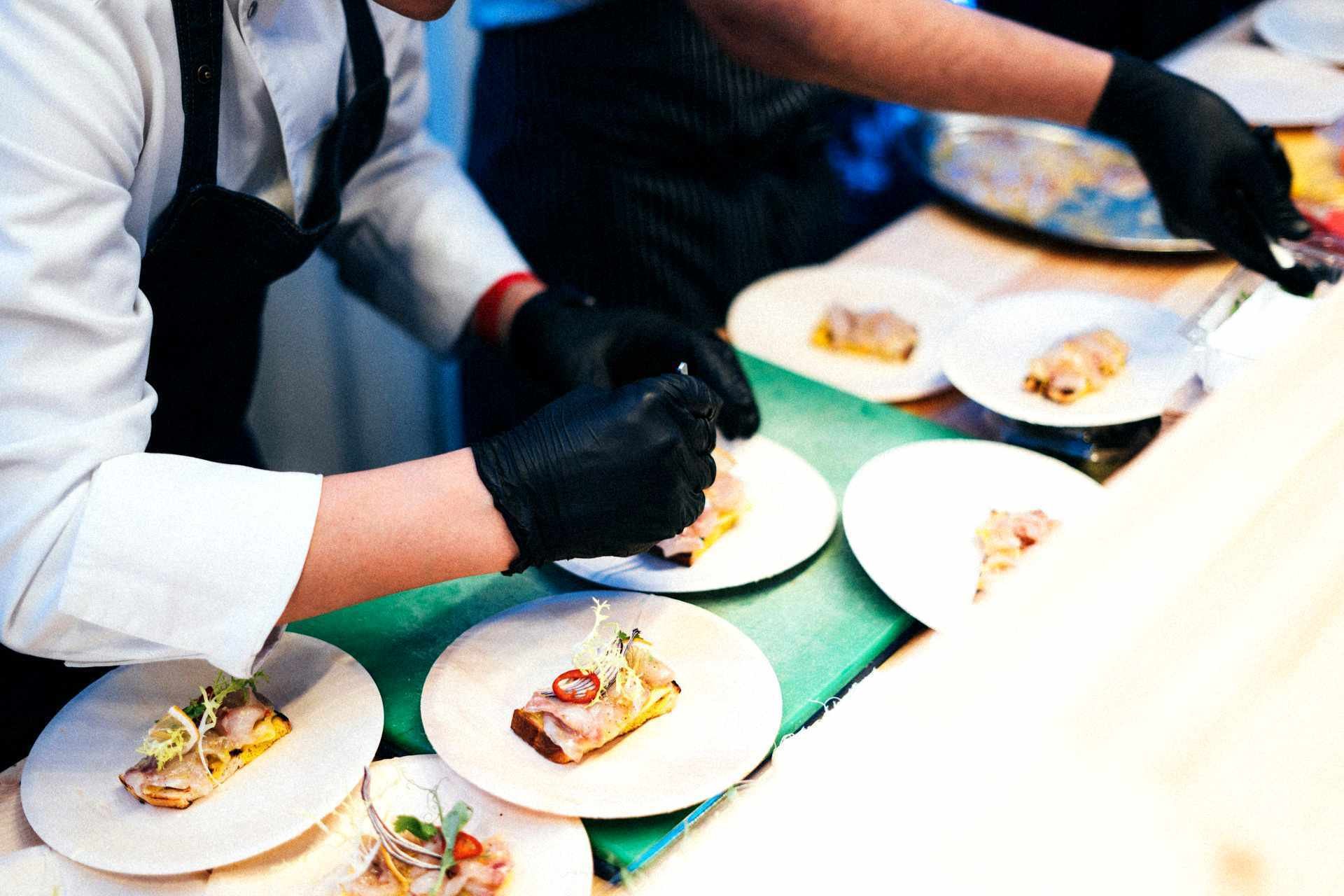 Chefs preparing a gourmet meal